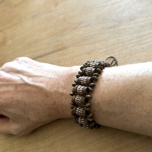 “Coffee bean” bracelet with decorative beads. Brown & white w/ adjustable pulls